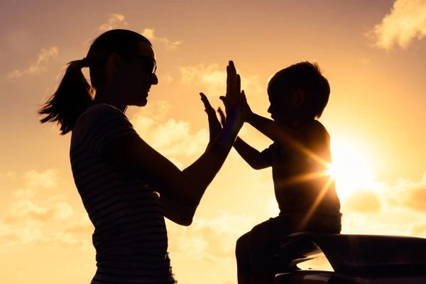 Image of happy mother and child after resolving child arrangements Ashington